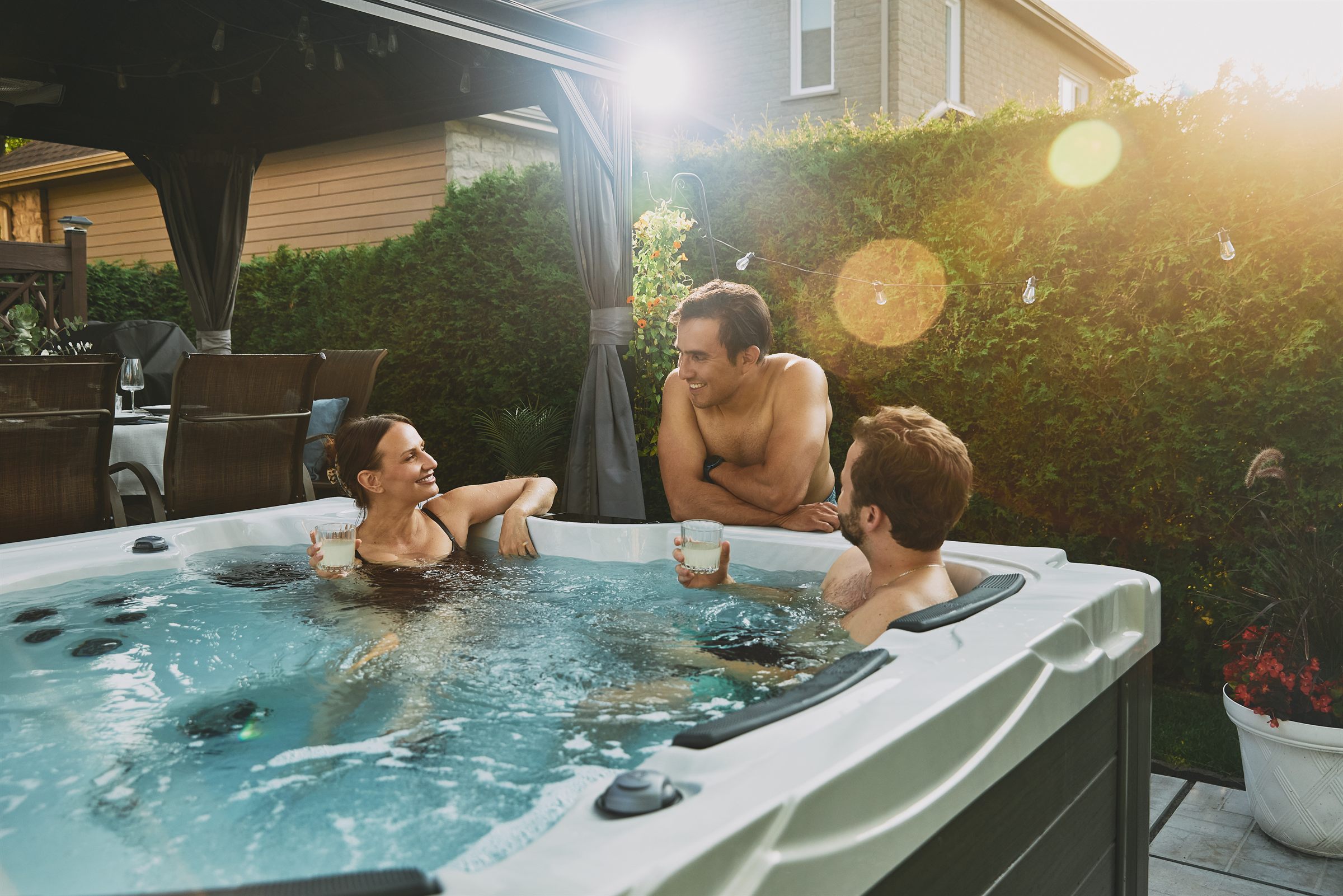 Friends relaxing together in a Gecko spa